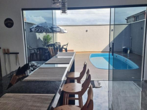 Casa Guaratuba piscina poucos metros da beira mar